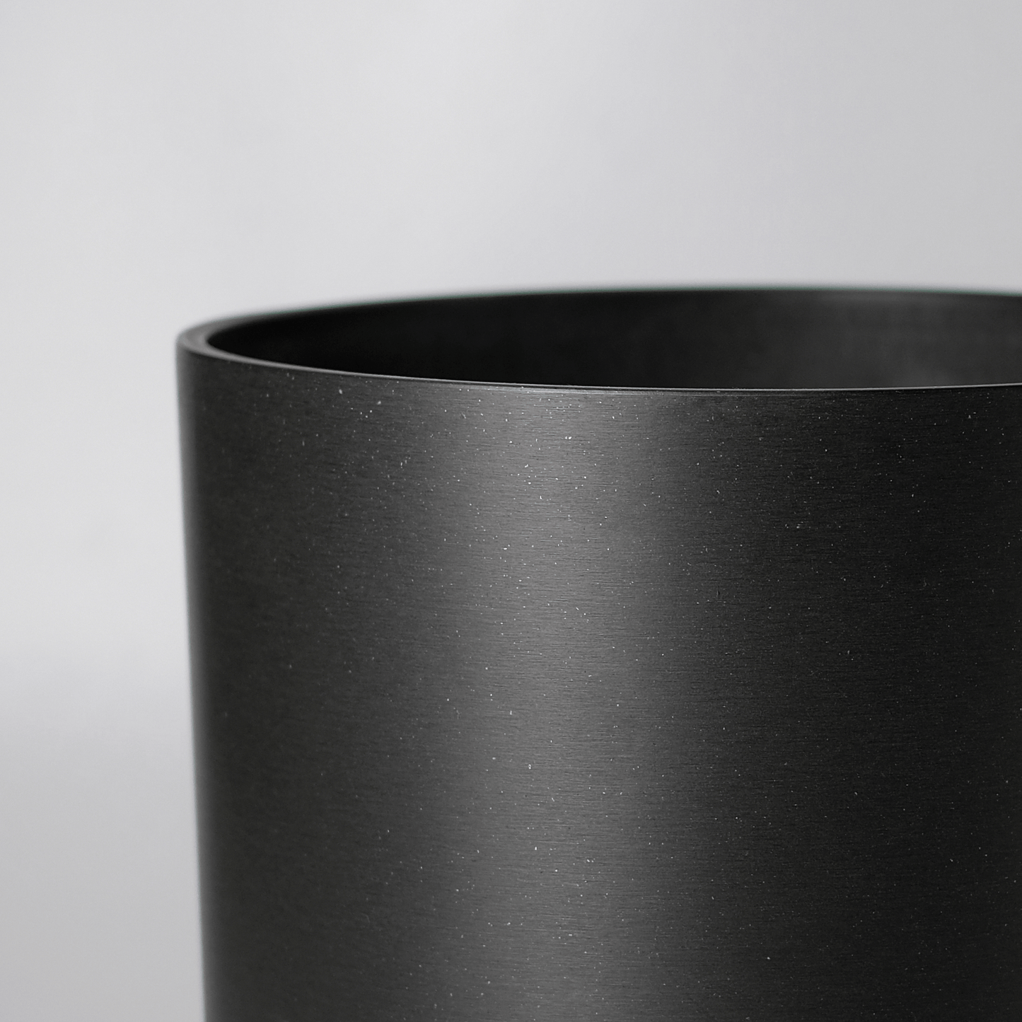 16" | 13" | 12" Black Signature Stone Planter & Saucer: 12" Black Kuro Planter & Saucer