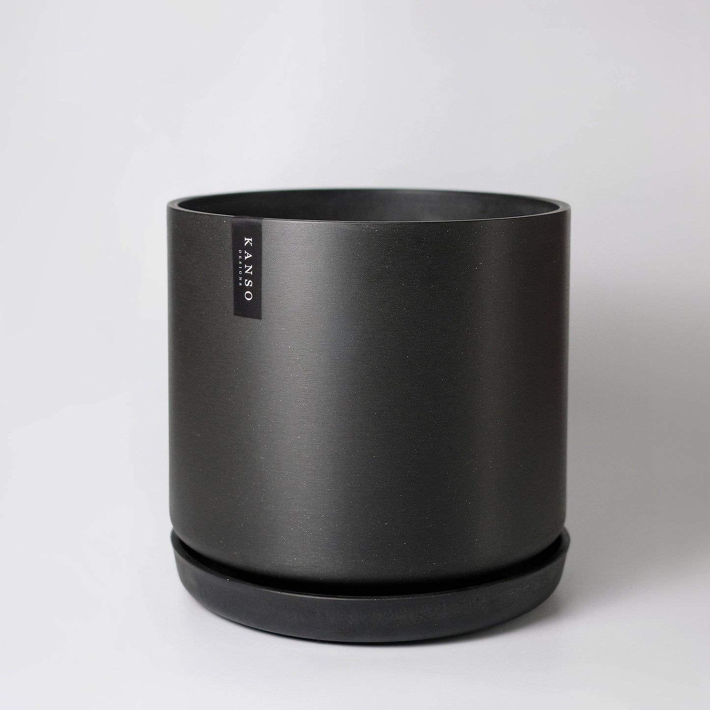 16" | 13" | 12" Black Signature Stone Planter & Saucer: 12" Black Kuro Planter & Saucer
